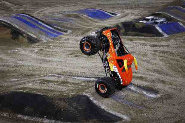 Armando Castro driving El Toro Loco drives on two wheels over a jump during Monster Jam at Snapdragon Stadium on Saturday, Jan. 4, 2025 in San Diego, CA. (Meg McLaughlin / The San Diego Union-Tribune)