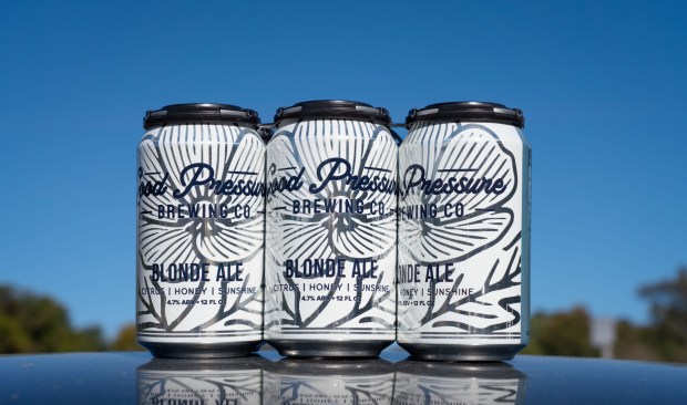 SAN DIEGO, CA - JANUARY 27: Cans of Good Pressure Brewing Company Blond Ale beer, photographed at the brewery, Tuesday January 27, 2026 in San Diego, California. (Howard Lipin / For The San Diego Union-Tribune)