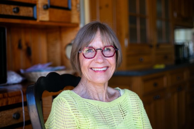 Diane Kane poses on Thursday, Aug. 15, at her home in La Jolla, CA. Kane was awarded a lifetime achievement award from the Save Our Heritage Organization for historic preservation. (Brittany Cruz-Fejeran / For The San Diego Union-Tribune)