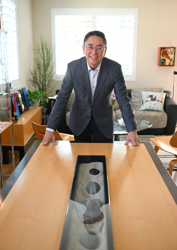 Bennett Peji, executive director of the local chapter of the American Institute of Architects, poses for a portrait at his home Dec.19, 2025 in San Diego, Calif. (Photo by Denis Poroy)