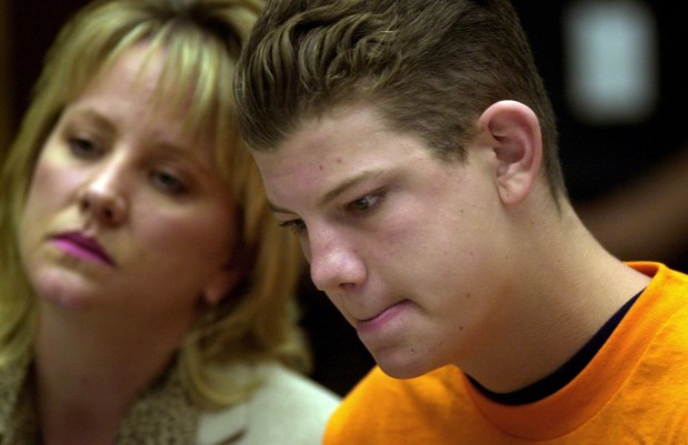 (PUBLISHED 06/21/2002, A-1): Charles "Andy" Williams pleaded guilty on Thursday, June 20, 2002, to more than a dozen felony charges stemming from the deadly shooting spree at Santana High School last year. The 16-year-old Williams now faces a minimum of 50 years to life behind bars, and a maximum of 435 years to life. Williams is shown here in court in El Cajon. (K.C. Alfred  U-T file)