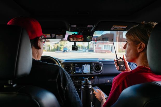 School counselor Juan Orozco and teacher Dawn Miller, both with the San Diego County Office of Education, conduct patrols around the community of Lincoln Park on Tuesday, Aug. 19, 2025. (Alejandro Tamayo / The San Diego Union-Tribune)