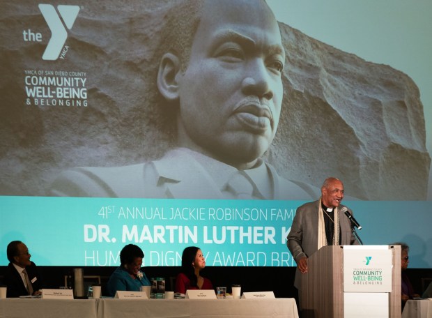 SAN DIEGO, CA - JANUARY 16: Dr. John E. Warren, delivers the keynote address, during the 41st annual Jackie Robinson Family YMCA, Dr. Martin Luther King, Jr., Human Dignity Award Breakfast, at the Towne and Country Resort in Mission Valley, Friday January 16, 2026, in San Diego, California. (Howard Lipin / For The San Diego Union-Tribune)