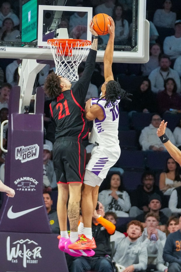 San Diego State's Miles Byrd fouls Grand Canyon's Makaih Williams during the final seconds of Wednesday's 70-69 Grand Canyon win at GCU Arena in Phoenix, Ariz. (Darryl Webb, for The San Diego Union-Tribune)