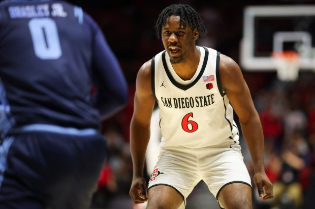 The current plan for SDSU guard Latrell Davis, shown here in the exhibition game against USD, is to redshirt this season. (Meg McLaughlin / The San Diego Union-Tribune)