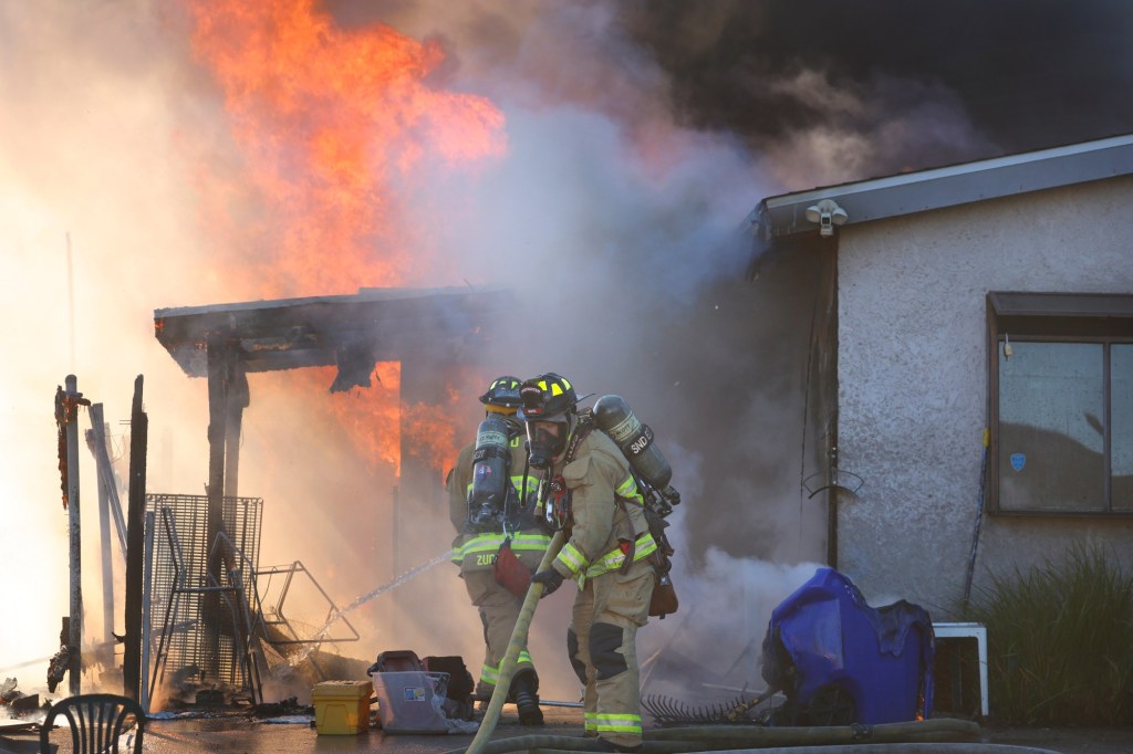 Wind-spread fire burns through Clairemont home, displaces 5 people
