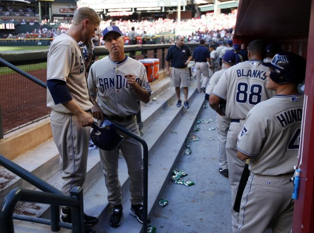 Padres Chase Headley and manager Bud Black walk off after a 6-3 loss to the Diamondbacks at Chase Field in Phoenix on Monday, April 5, 2010. (K.C. Alfred, The San Diego Union-Tribune)