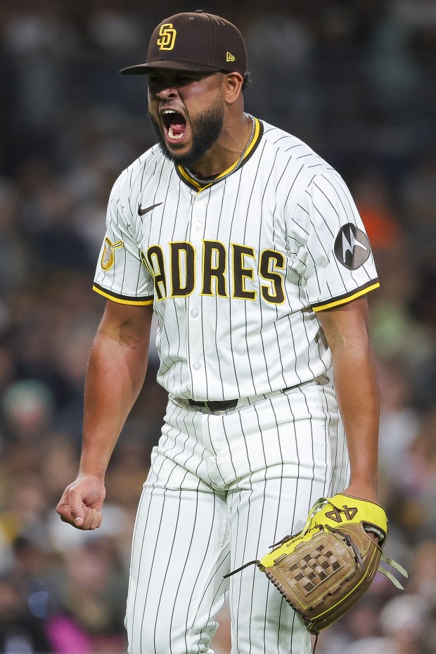 Randy Vasquez #98 of the San Diego Padres reacts after striking out Jordan Beck #27 of the Colorado Rockies during the sixth inning at Petco Park on Thursday, Sept. 11, 2025 in San Diego, California. (Meg McLaughlin / The San Diego Union-Tribune)