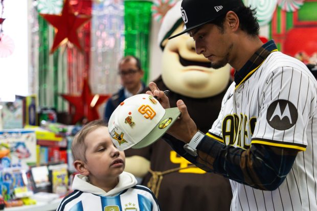 Yu Darvish of the San Diego Padres shops for gifts with parents and their children at the Ronald McDonald House on December 15, 2025 in San Diego, California. (Photo by Matt Thomas/San Diego Padres)