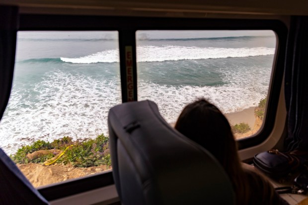 Margo Haugum, of San Diego, looks out the window as she rides a Pacific Surfliner train on Wednesday, Jan. 21, 2026. (Meg McLaughlin / The San Diego Union-Tribune)