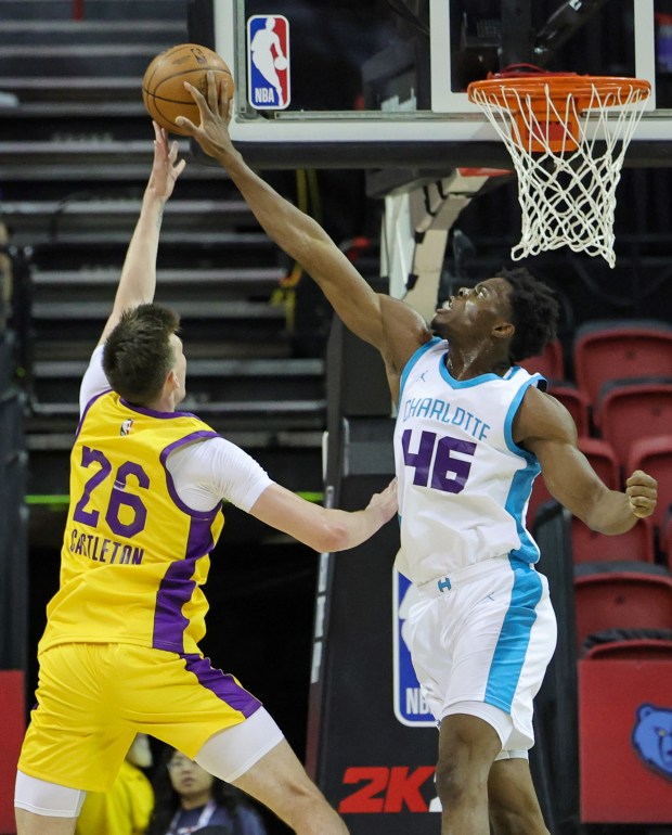 James Nnaji #46 of the Charlotte Hornets blocks a shot by Colin Castleton #26 of the Los Angeles Lakers in the first half of a 2023 NBA Summer League game at the Thomas & Mack Center on July 09, 2023 in Las Vegas, Nevada. NOTE TO USER: User expressly acknowledges and agrees that, by downloading and or using this photograph, User is consenting to the terms and conditions of the Getty Images License Agreement. (Photo by Ethan Miller/Getty Images)