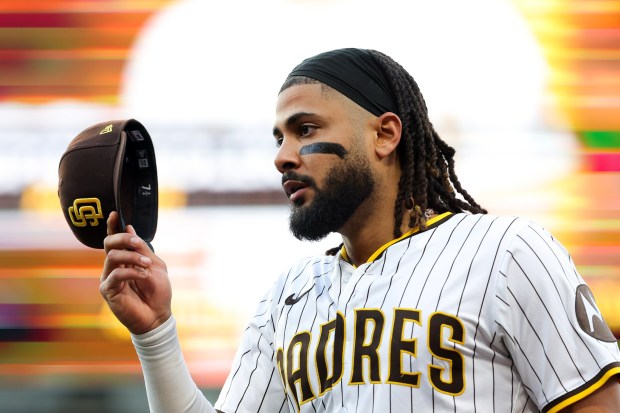 San Diego Padres' Fernando Tatis Jr. walks back to the dugout during the second inning against the Washington Nationals at Petco Park on Tuesday, June 24, 2025 in San Diego, CA.(Meg McLaughlin / The San Diego Union-Tribune)