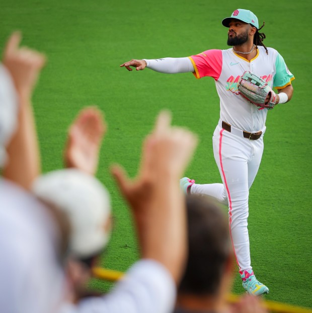 San Diego Padres right fielder Fernando Tatis Jr. #23 gestures to the crowd before their game against the Boston Red Sox at Petco Park on Friday, Aug. 8, 2025 in San Diego, CA.