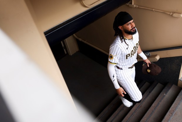Fernando Tatis Jr. #23 of the San Diego Padres walks to the dugout before their game against the Los Angeles Dodgers at Petco Park on Saturday, Aug. 23, 2025 in San Diego, CA.