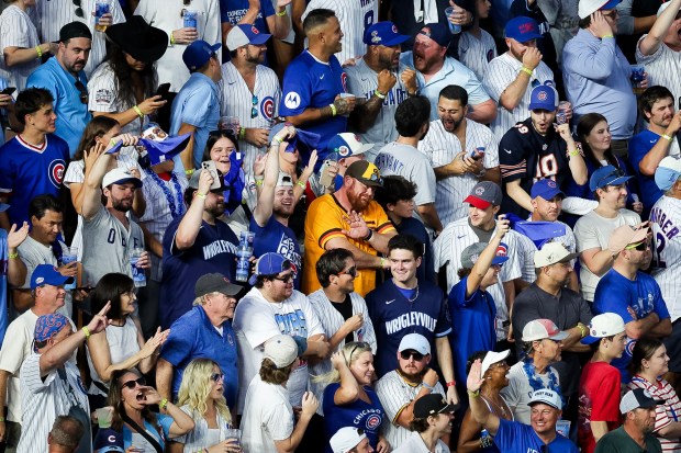 Chicago Cubs and San Diego Padres react after Michael Bush of the Chicago Cubs home run during the seventh inning during Game 3 of the NL Wild Card Series at Wrigley Field on Thursday, Oct. 2, 2025 in Chicago, Illinois. (Meg McLaughlin / The San Diego Union-Tribune)