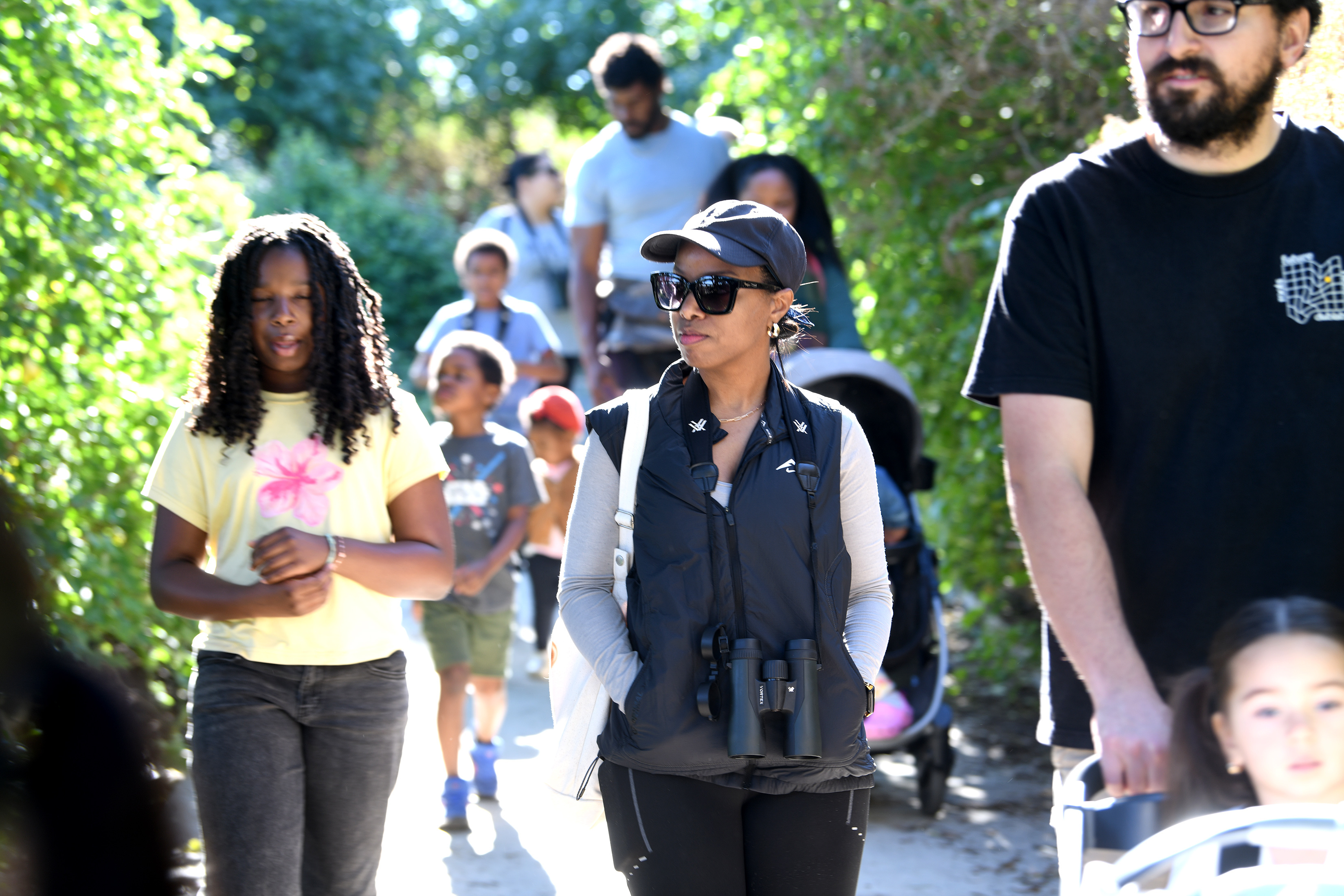 Aquarium educators guide participants on a Cabrillo Beach walk through...