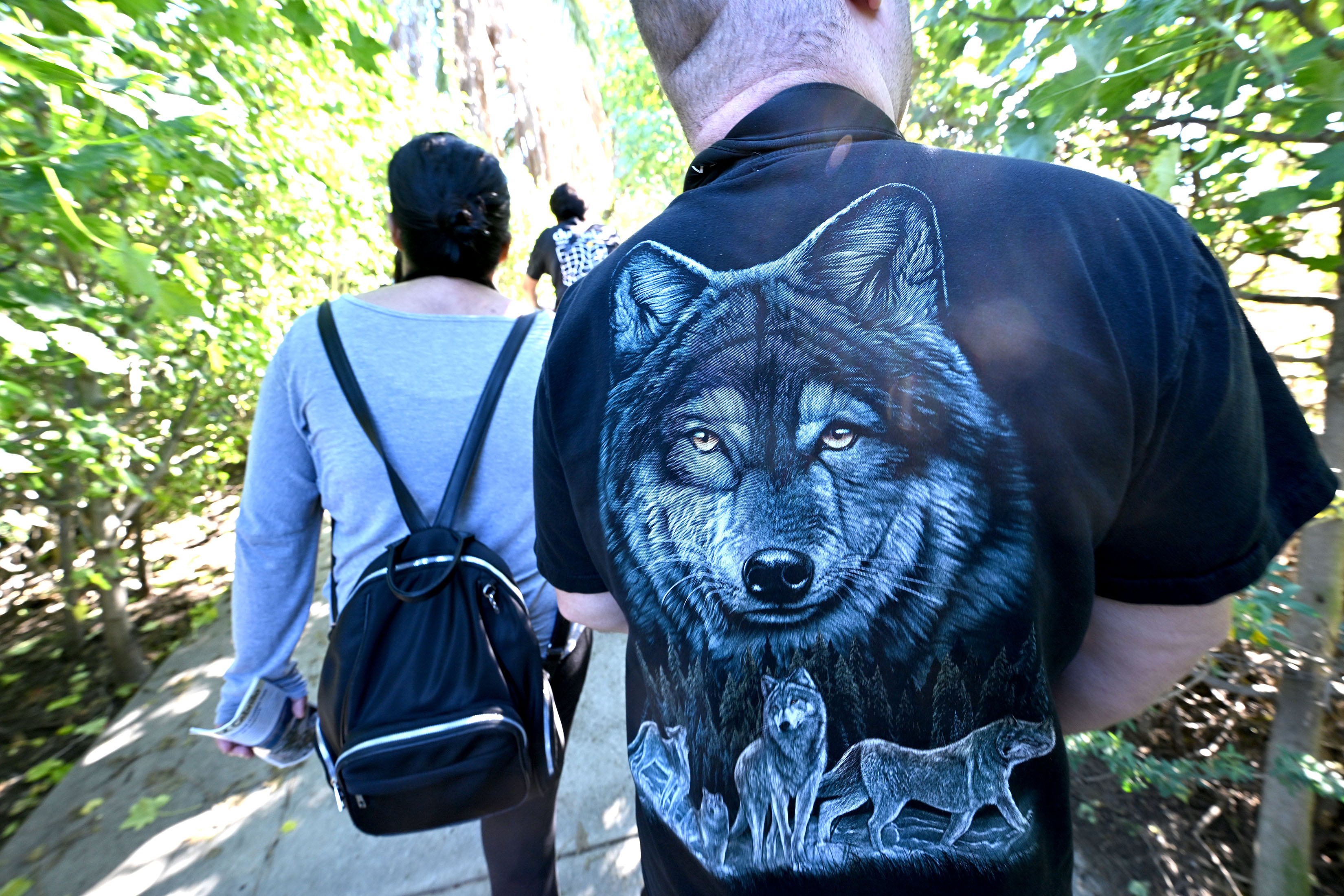 Aquarium educators guide participants on a Cabrillo Beach walk through...