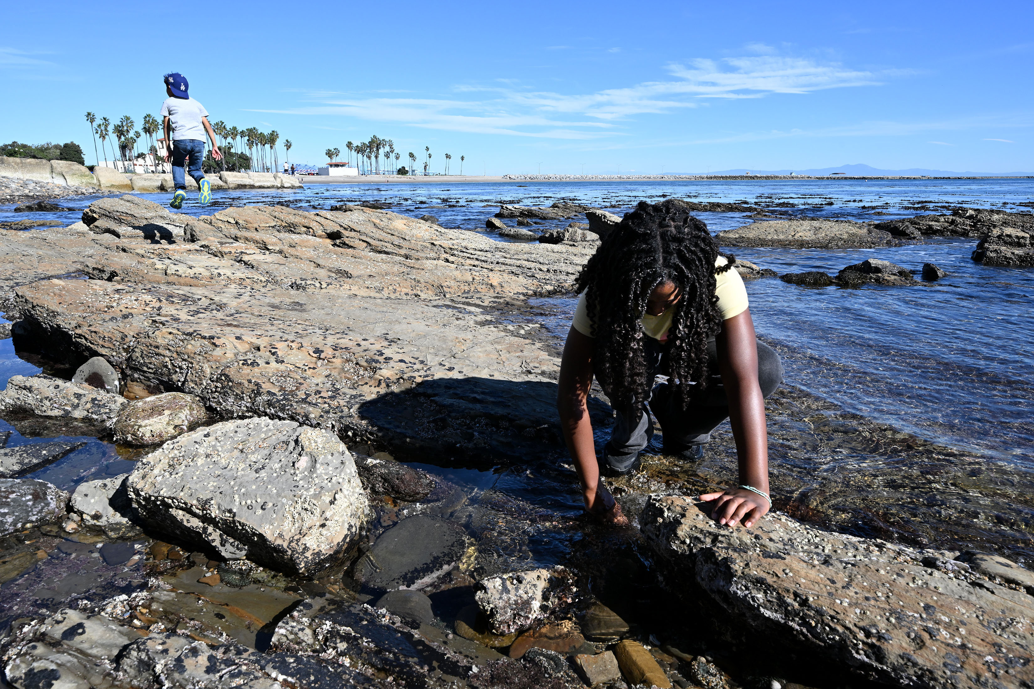 Peyton Hampton, 11, enjoys the tide-pools during a Cabrillo Beach...
