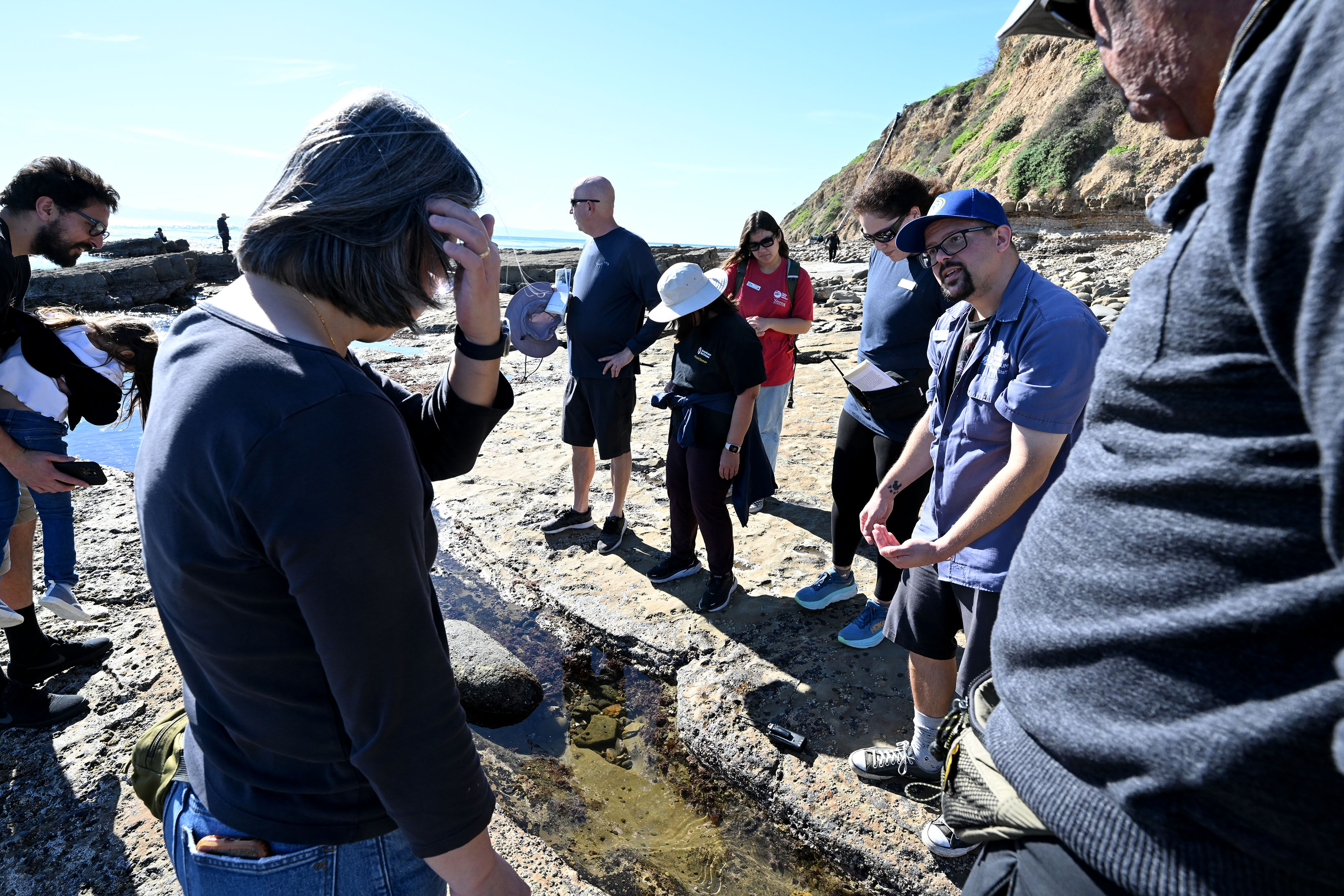 Bayne Westrick-Snapp, an aquarium educator, shows off a California two-spot...