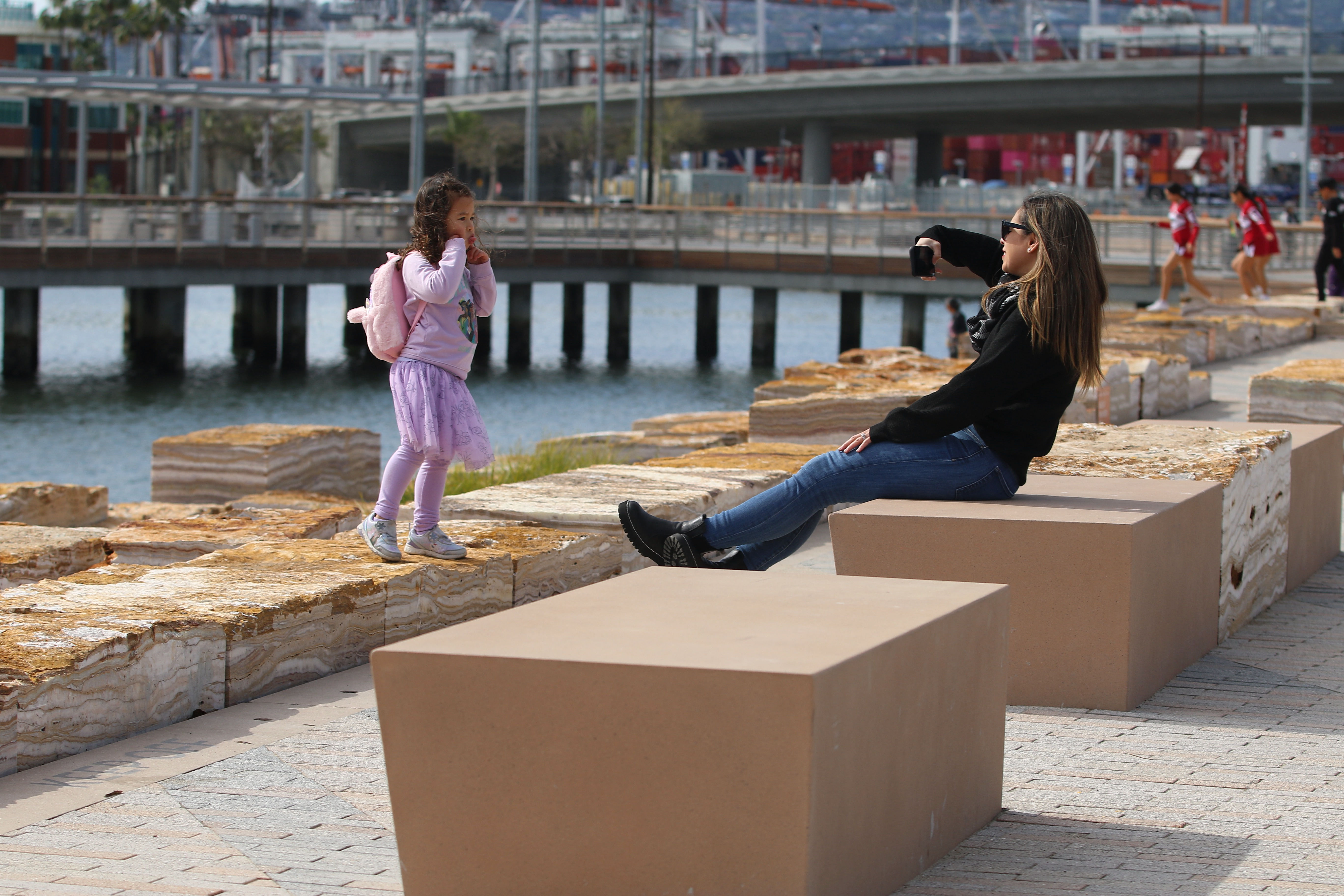 The Wilmington Waterfront Promenade serves as the backdrop for a...