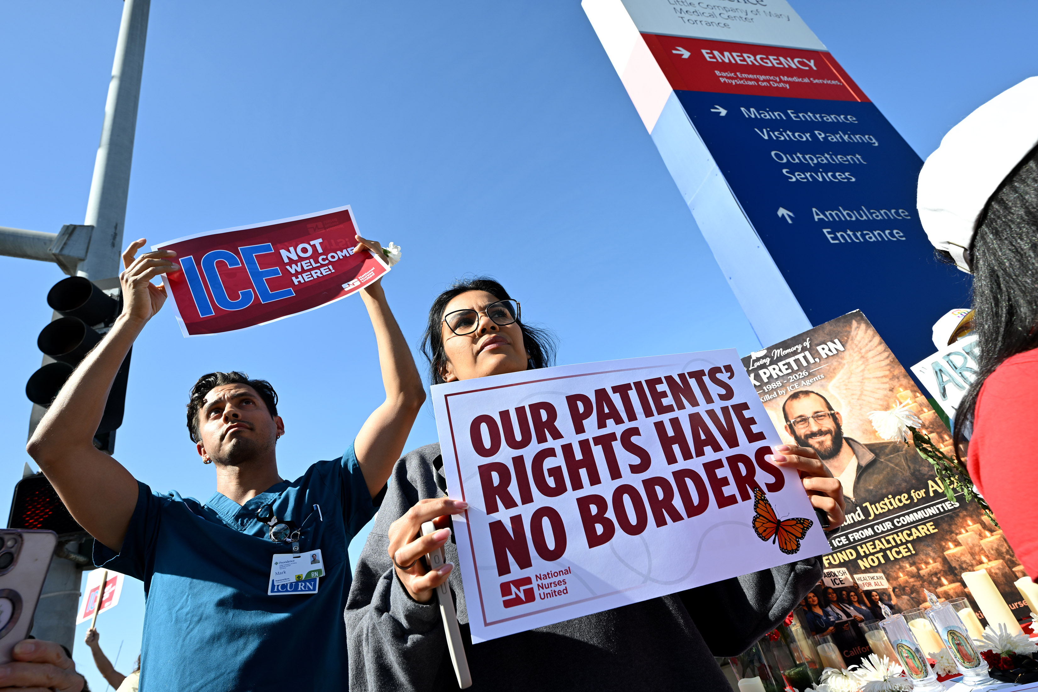 Nurses and community members stage a walk-out to protest in...
