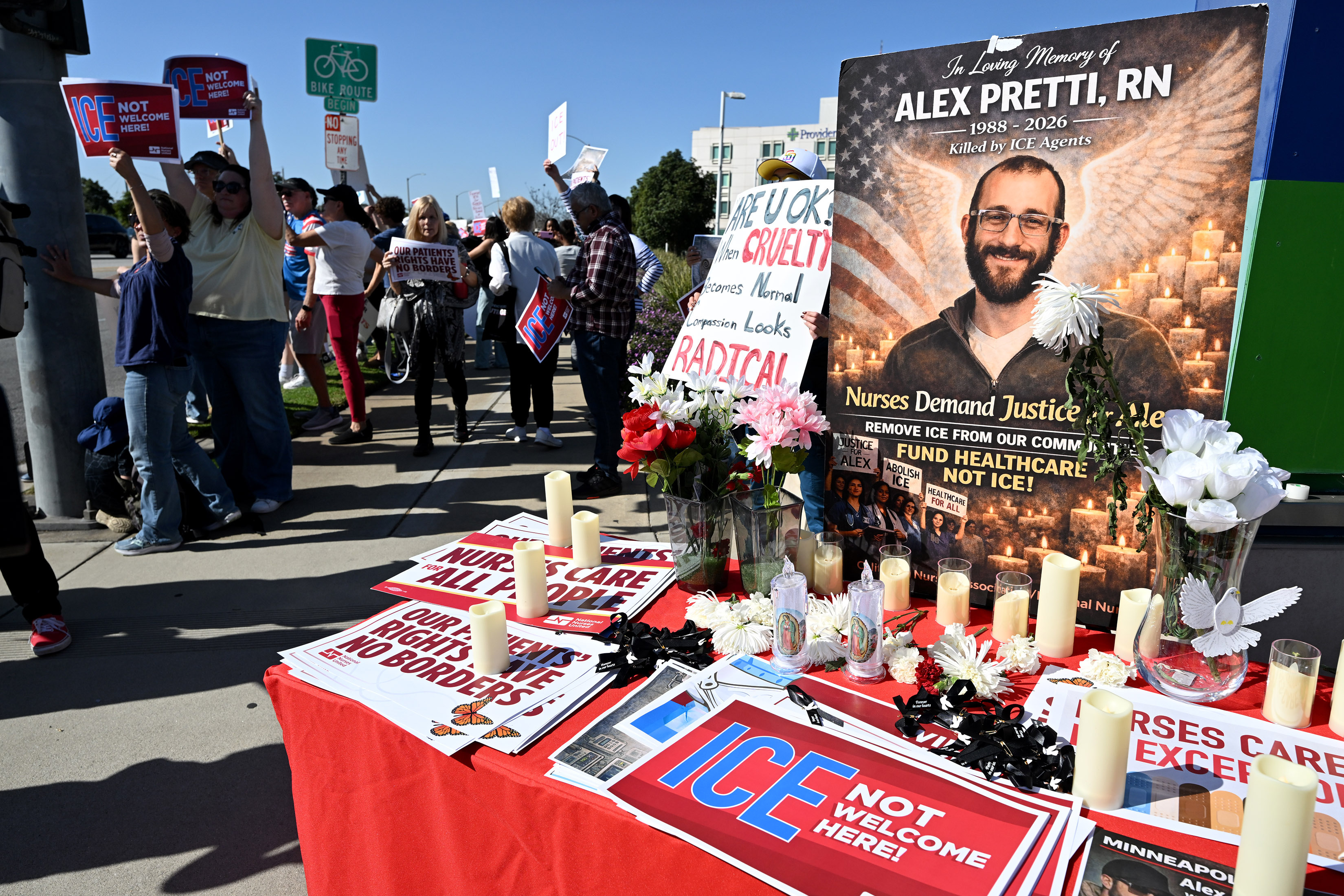 Nurses and community members stage a walk-out to protest in...