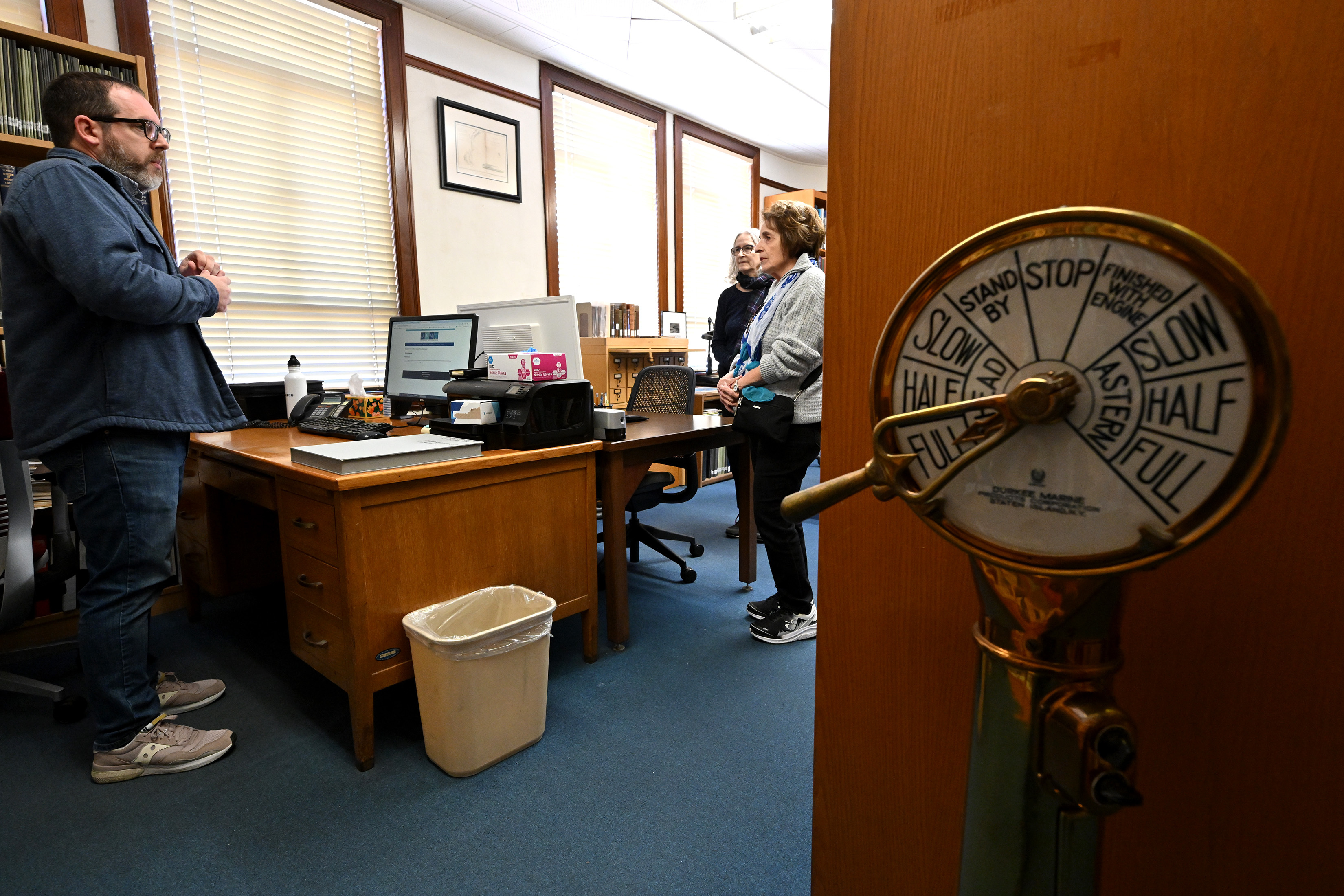 Derek Spinei, an archivist with the Los Angeles Maritime Museum,...