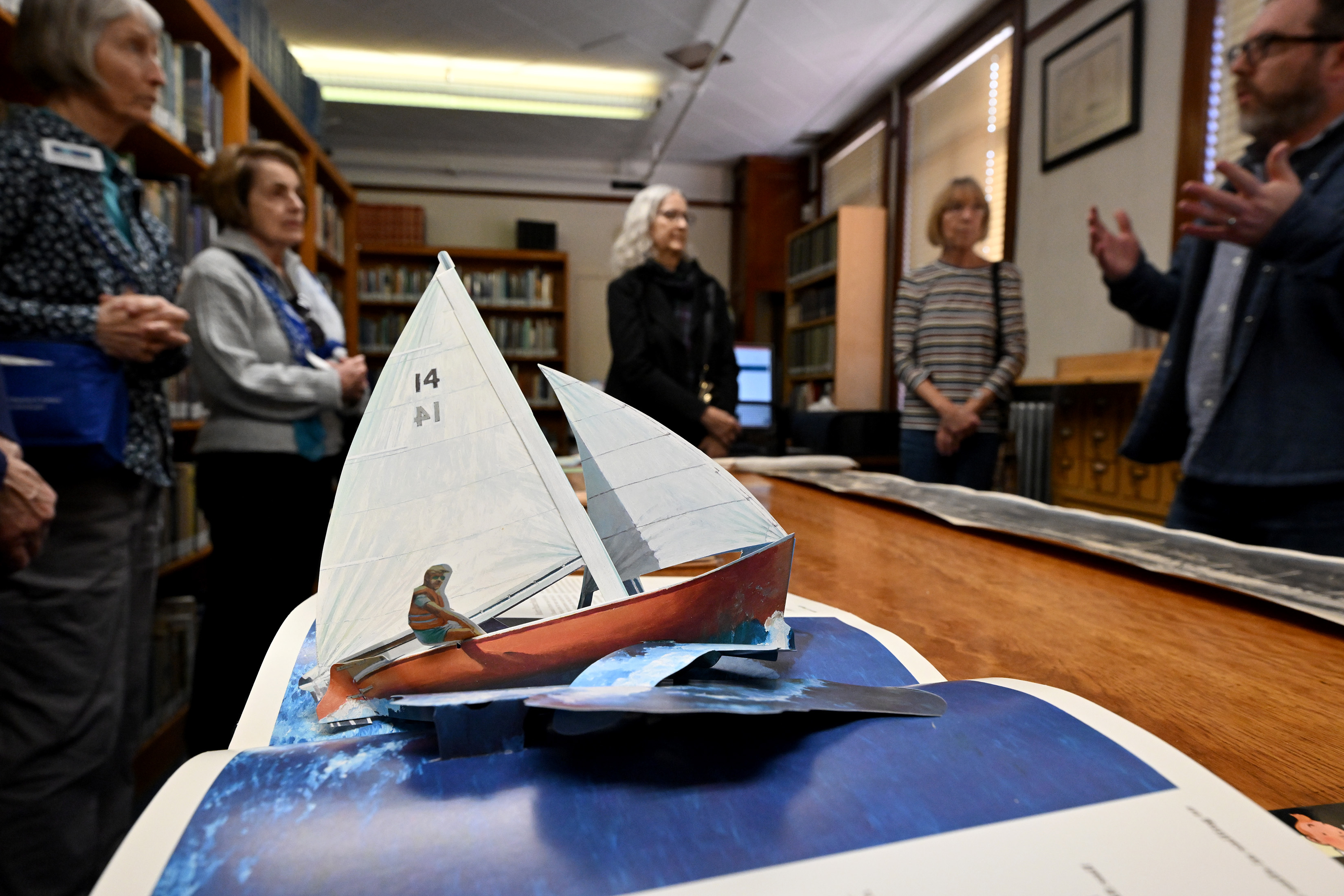 Derek Spinei, an archivist with the Los Angeles Maritime Museum,...