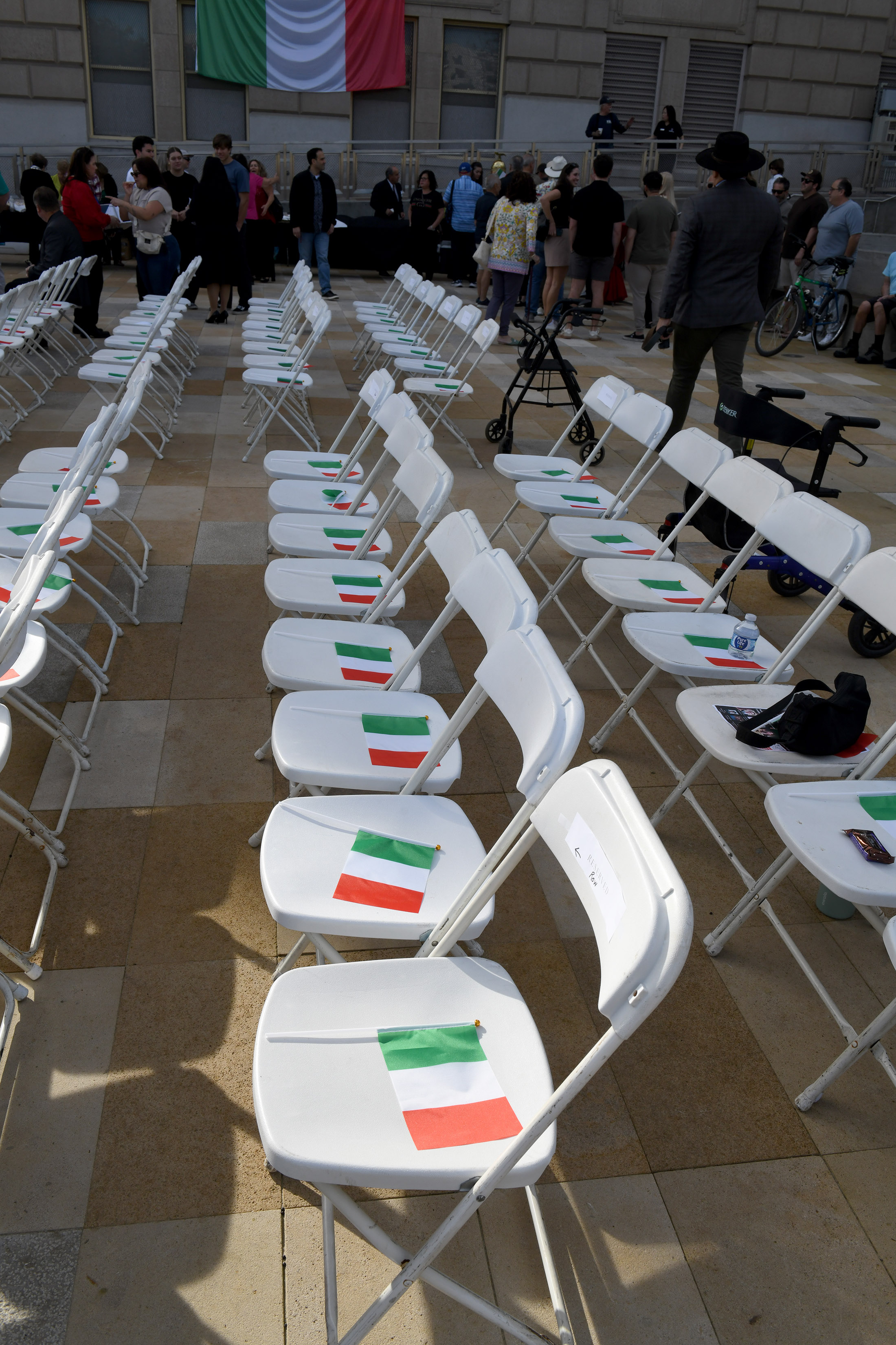 Officials and members of the public come together for a...