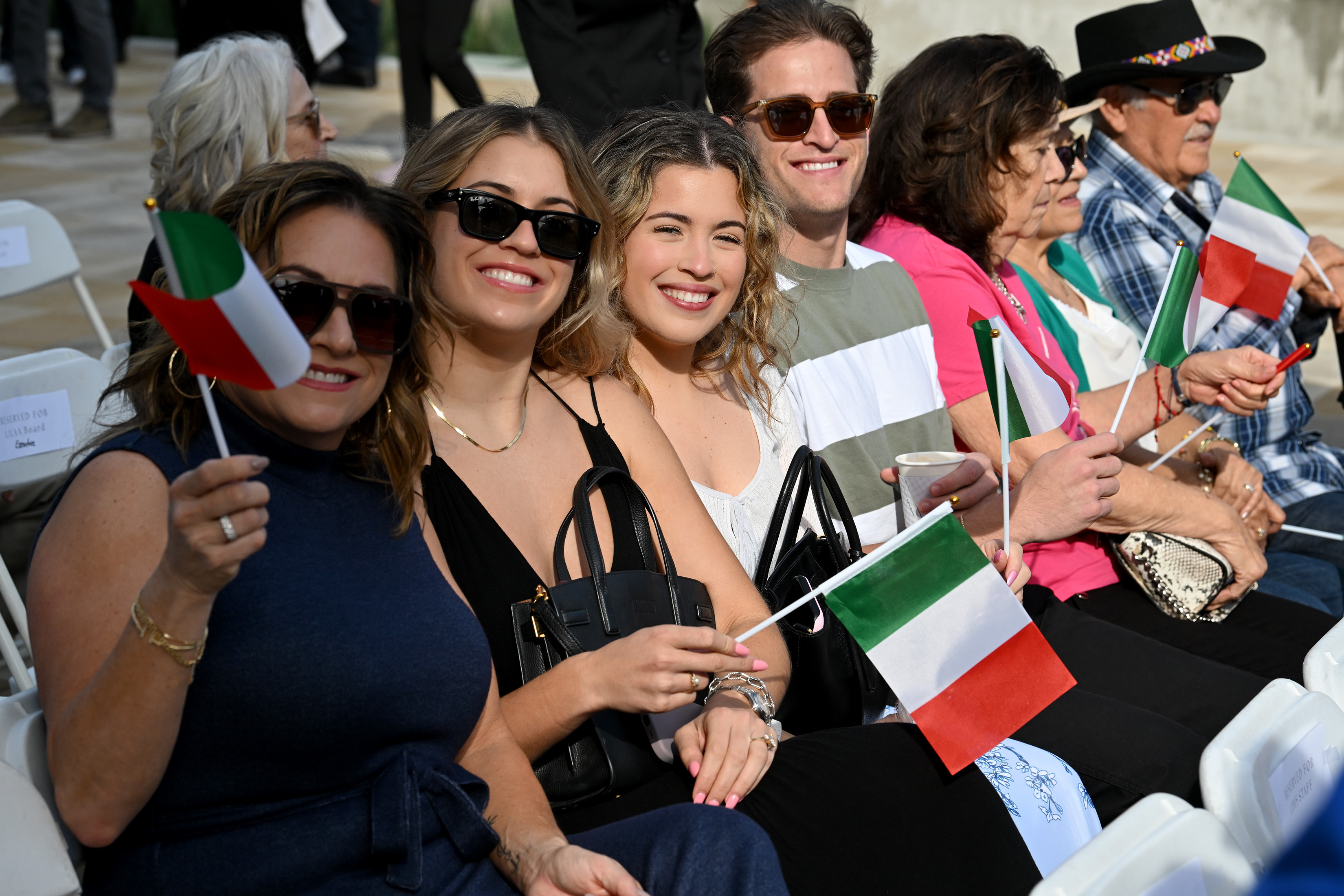 The Amalfitano Family sits together for the official program before...
