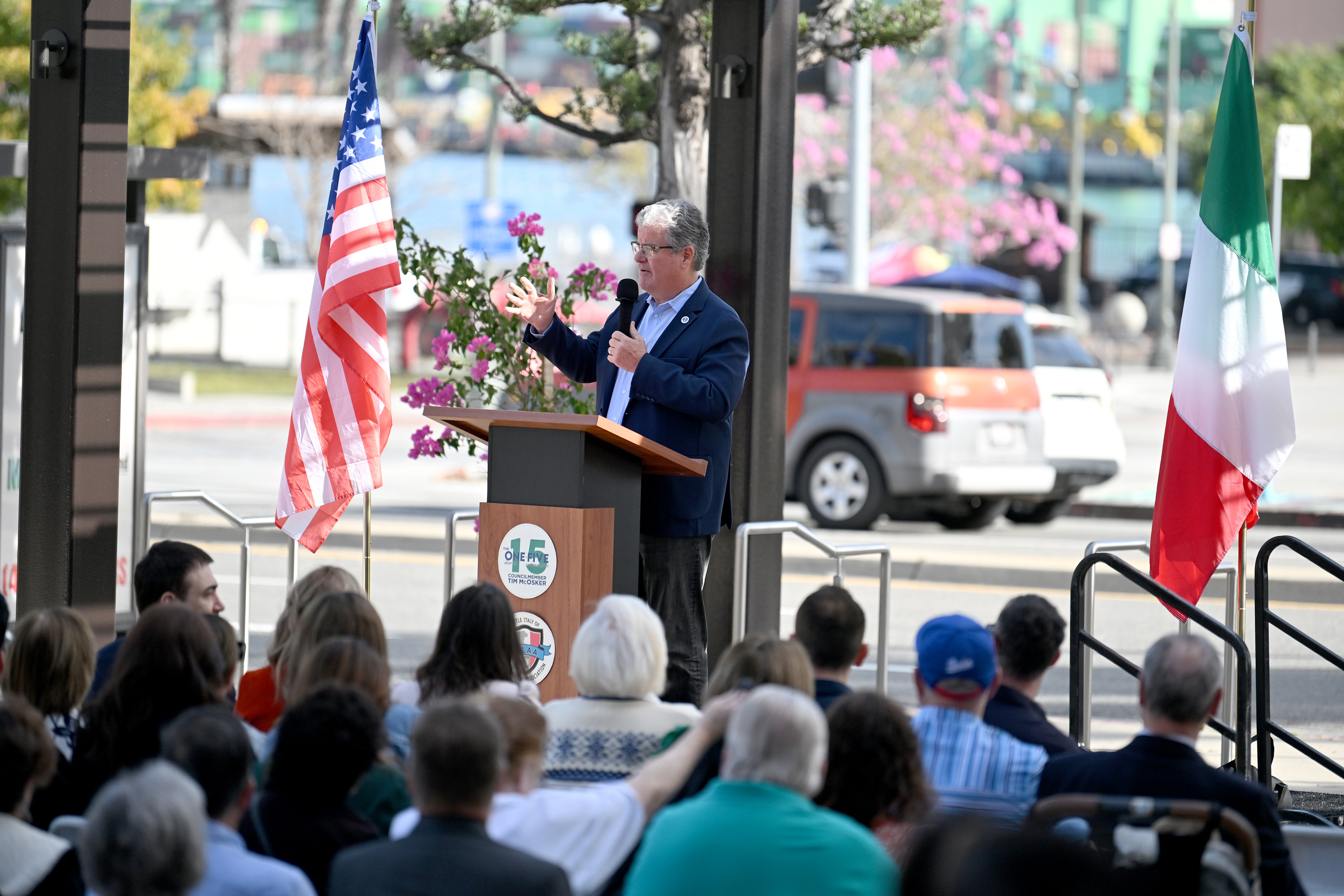 Councilmember Tim McOsker officiates the ribbon-cutting ceremony with the Little...
