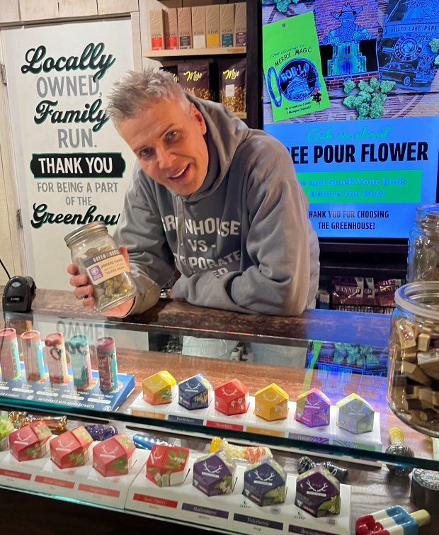 man at store counter