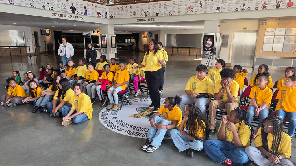 Image of Thomas Elementary School students and staff at the Fresno Athletic Hall of Fame