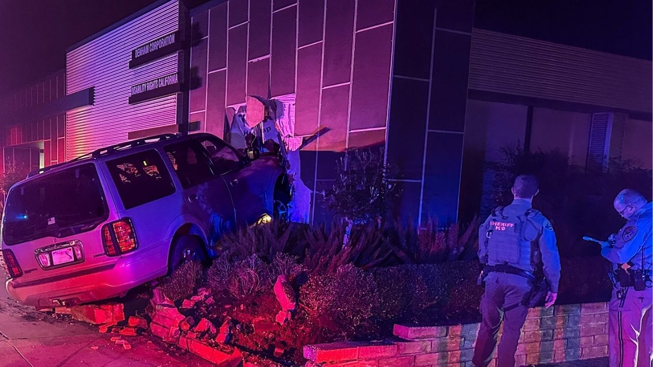 Two people were arrested for DUI in Fresno after the passenger grabbed the wheel and helped crash an SUV into a local business. (CHP)