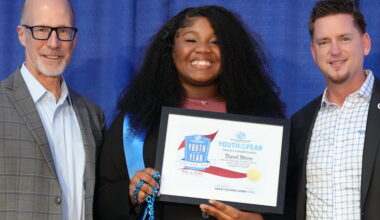a student and two award hosts