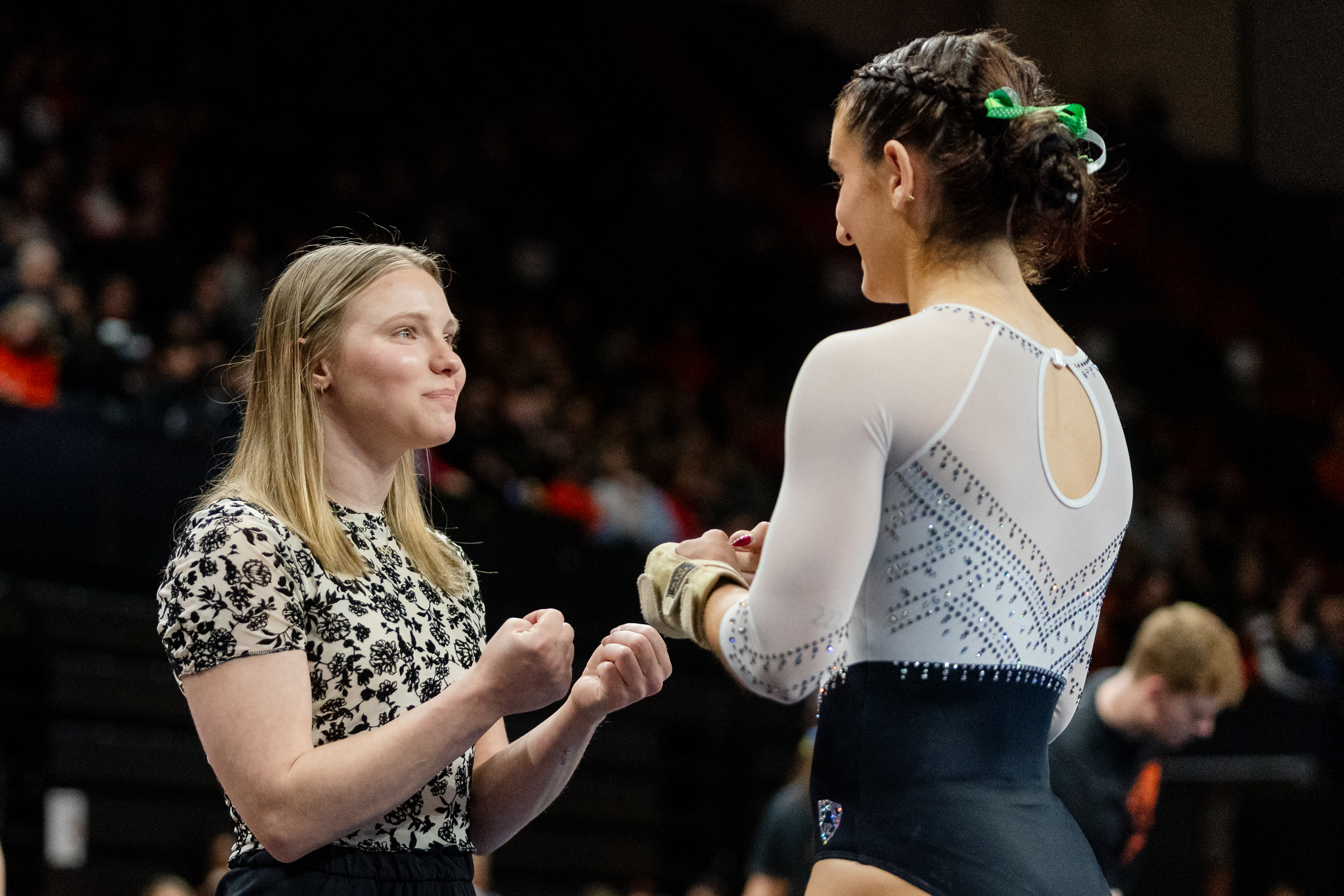 Student Assistant Coach Jade Carey of the Oregon State Beavers gives a pep-talk to Sophia Esposito before her floor routine during a gymnastics meet against the Sacramento State Hornets at Gill Coliseum on January 16, 2026 in Corvallis, OR.