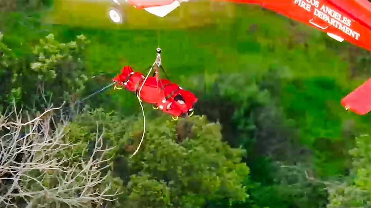 Woman airlifted by helicopter