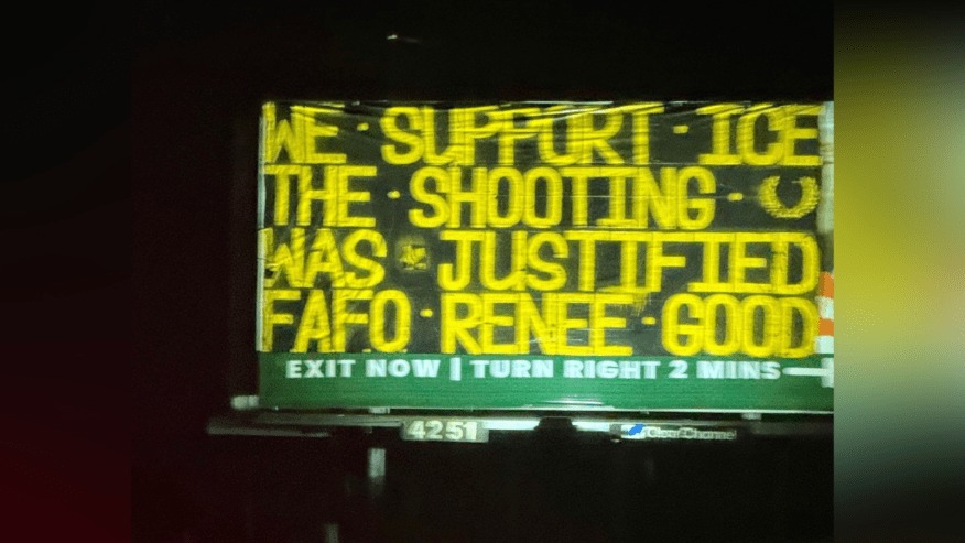 A billboard next to a Southern California freeway with "WE SUPPORT ICE THE SHOOTING WAS JUSTIFIED FAFO RENEE GOOD" in yellow text on a black background.