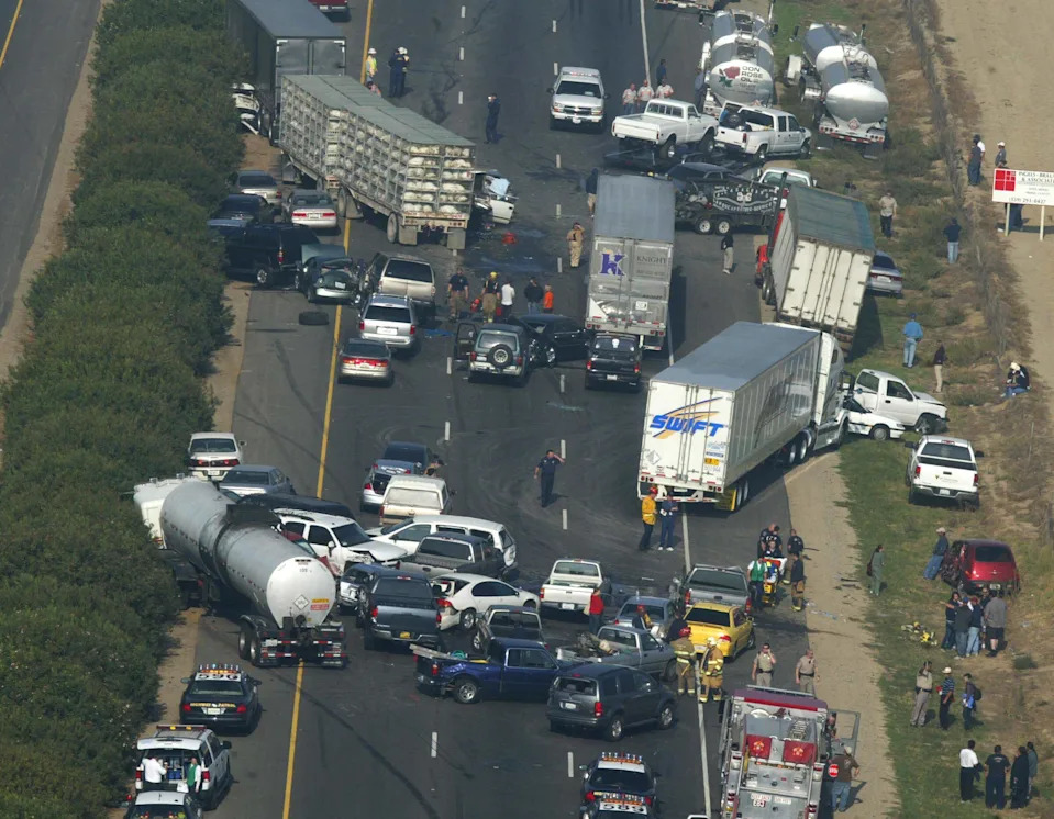 FRESNO, CA 11-4-2007- MTD JRW 99 PILEUP OVERVIEW 2 Wrecked cars and trucks from the fog related accident strewn across freeway 99 looking north, between Clovis and American Avenues, Saturday morning. John Walker/fresno Bee