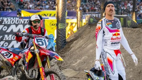 SX 2026 Rd 01 Anaheim 1 450 Justin Barcia walks bike to track.jpg