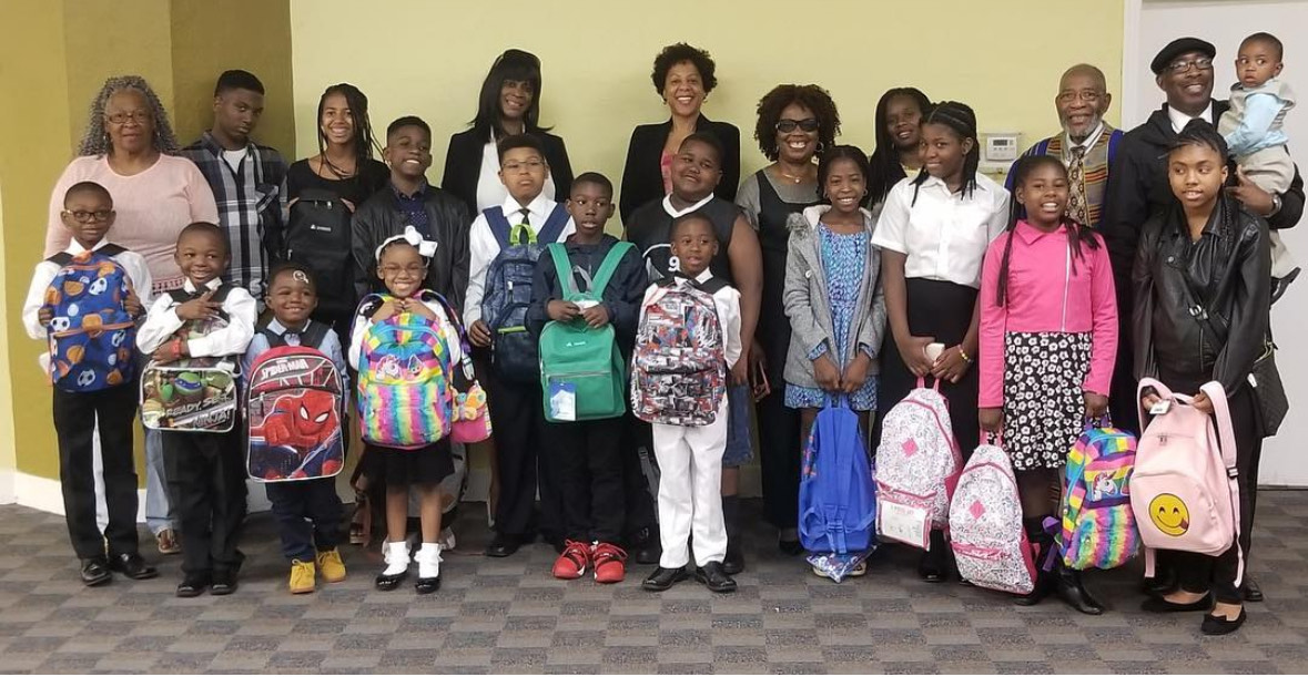 dr.-rev.-amos-c.-brown-top-row-second-from-right-with-teachers-and-educators-at-third-baptist-churchs-free-back-on-track-and-freedom-school-programs.-photo-courtesy-of-third-baptist-church-sf, $5 Million Reparations Fund: From Slavery’s Shadows, SF Mayor Signs Historic Measure for Black San Franciscans, Featured Local News & Views 