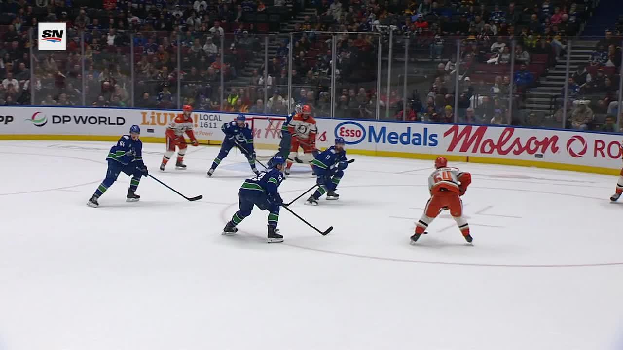 Tolopilo makes 32 saves in Canucks' 2-0 win over Ducks, but doesn't get credit for shutout