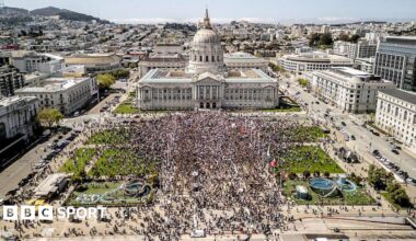 Crowds gather outside City Hall on the Civic Center Plaza in San Francisco