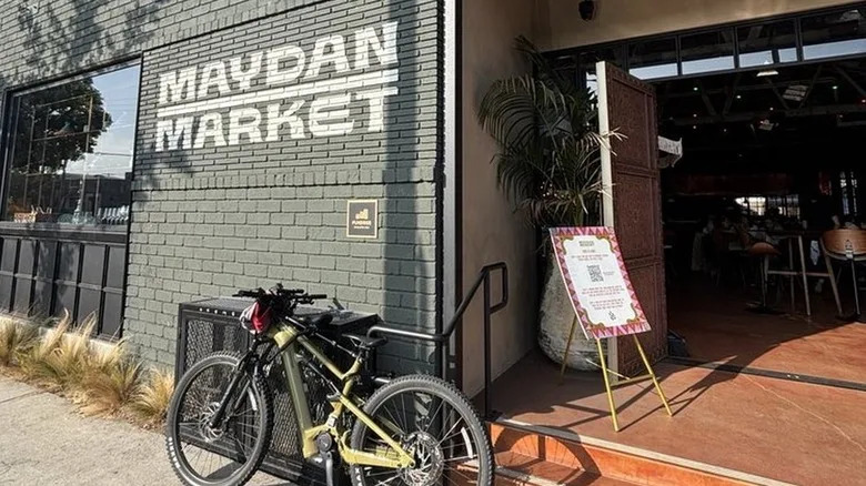 The entrance to the Maydan Market, with a bike parked in front