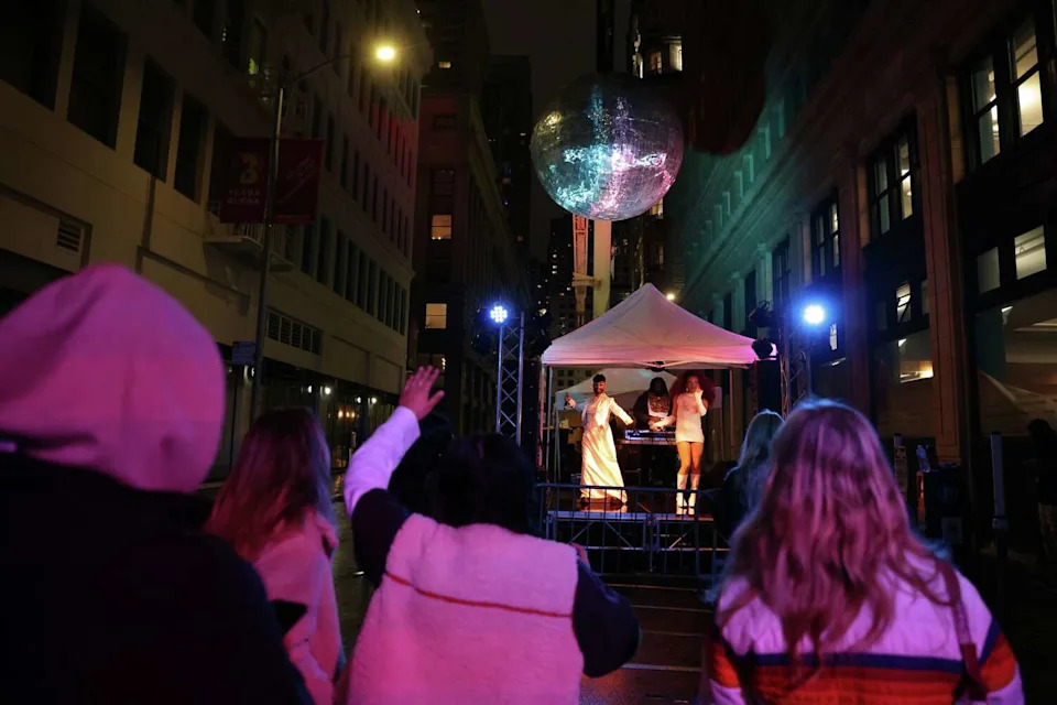 Magnolia Polaris & Booty Juice B2B perform on Jesse Street west of 2nd Street during a Downtown First Thursdays street party in San Francisco on Thursday. (Scott Strazzante/S.F. Chronicle)
