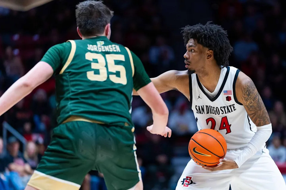 San Diego State guard Taj DeGourville (24) looks to pass during an NCAA Basketball game between Colorado State and San Diego State, Wednesday January 28, 2026 at Viejas Arena in San Diego, Calif.