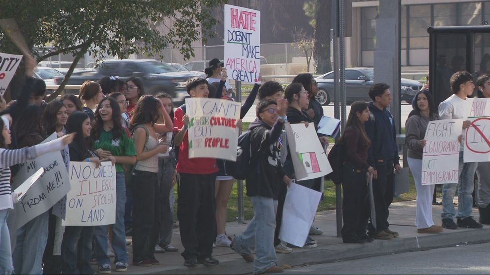 Community members participated in a protest on Friday afternoon in response to immigration enforcement across the country. PHOTO: KBAK/KBFX