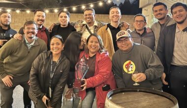 group of people posed at a pub
