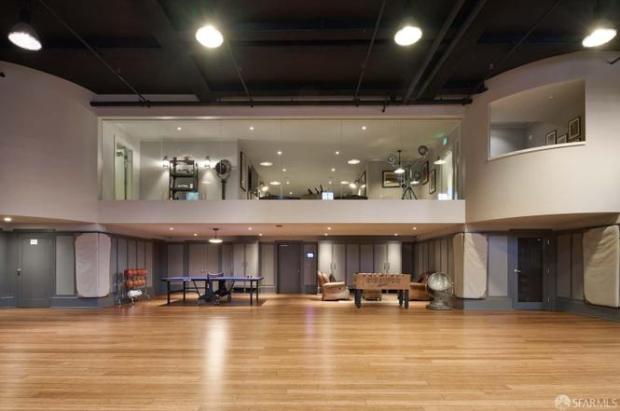 A view from the basketball court looking up into a home gym.