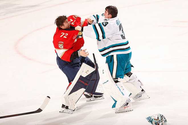 SUNRISE, FLORIDA - JANUARY 19: Goaltender Sergei Bobrovsky #72 of the Florida Panthers fights with Goaltender Alex Nedeljkovic #33 of the San Jose Sharks at the Amerant Bank Arena on January 19, 2026 in Sunrise, Florida. (Photo by Eliot J. Schechter/NHLI via Getty Images)